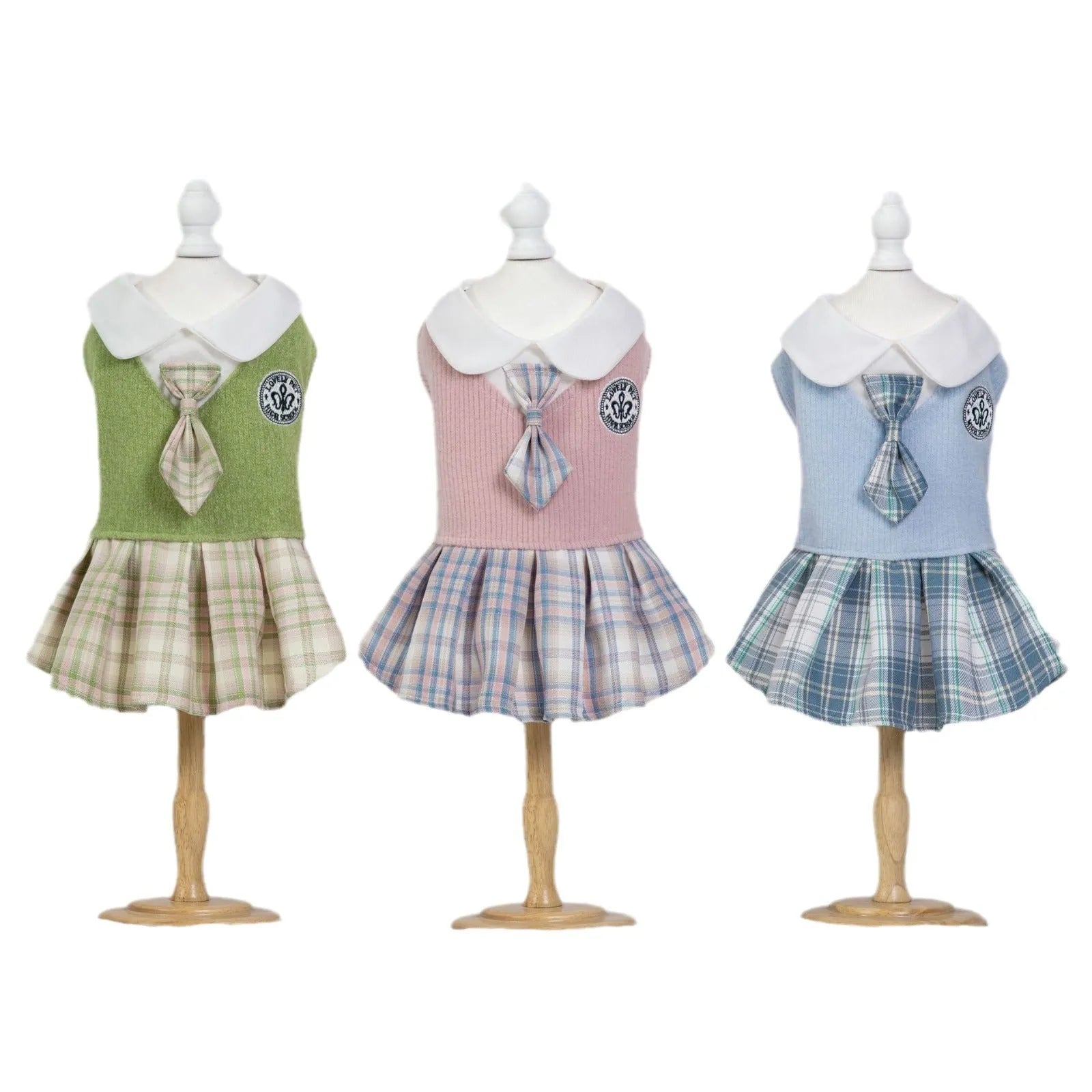 A pink, blue, or green tartan skirt for small dogs or cats in a princess costume style.