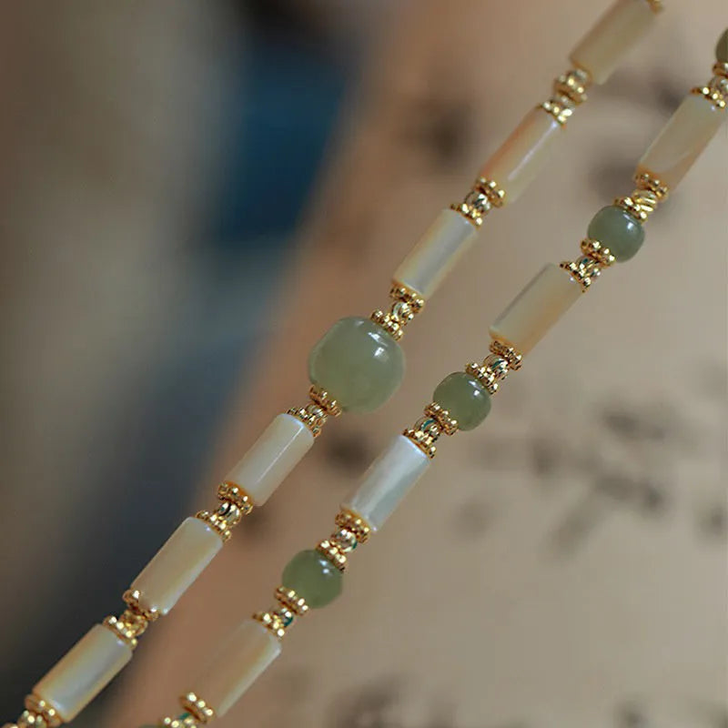 Handmade Hetian Jade white lip shell bracelet with round natural jade beads in geometric style