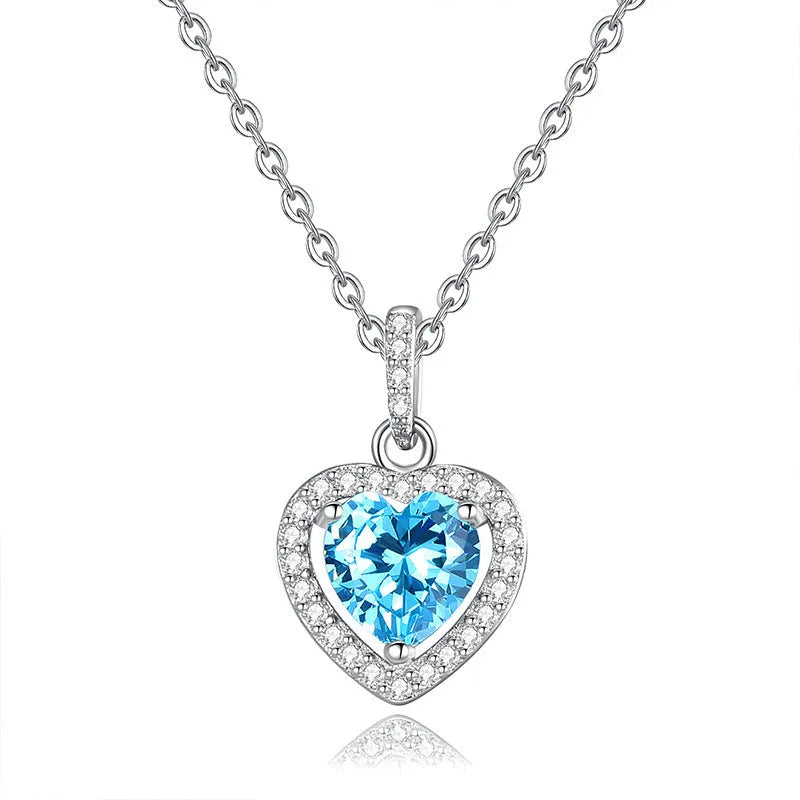 925 silver necklace with heart-shaped pendant containing natural gemstone on cross chain