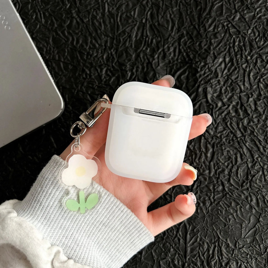 Transparent green TPU earphone sleeve with embossed cartoon tulip pattern on Apple AirPods charging case