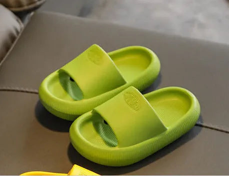 Mixed colour children's EVA slippers with a non-slip sole, shown in sizes for kids.