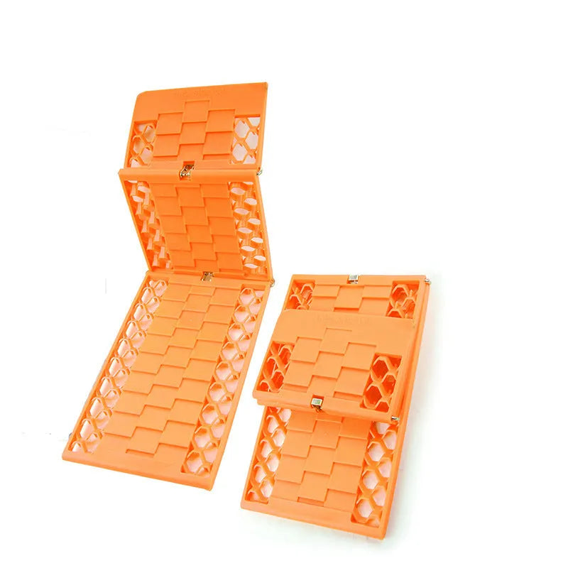 Folding anti slip mud snow rescue boards for automobiles in orange and red colours showing folded and unfolded positions