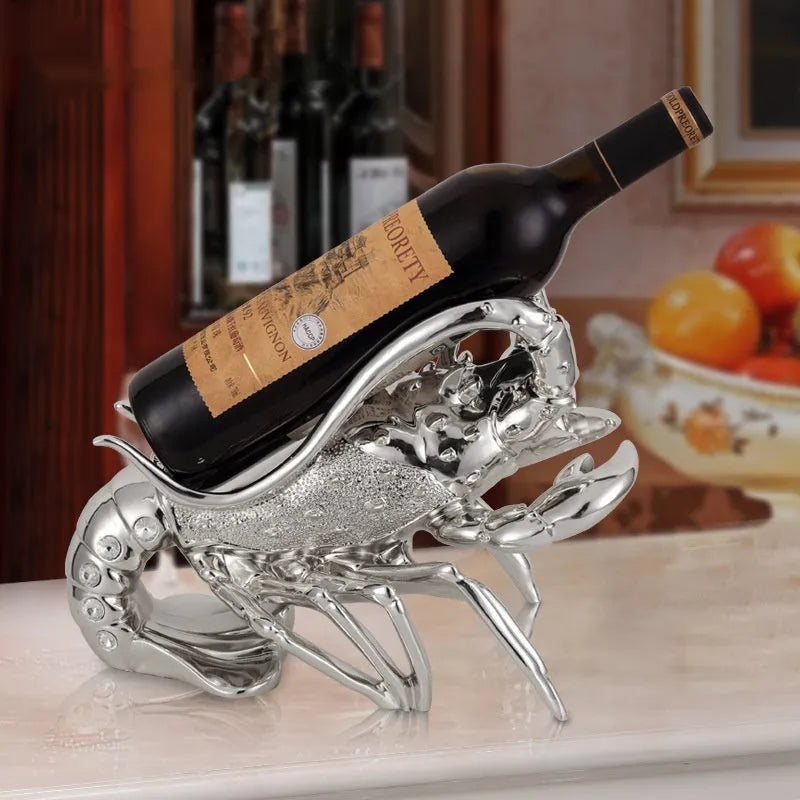 Lobster-shaped decorative wine bottle holder ornament in rose gold or silver resin.