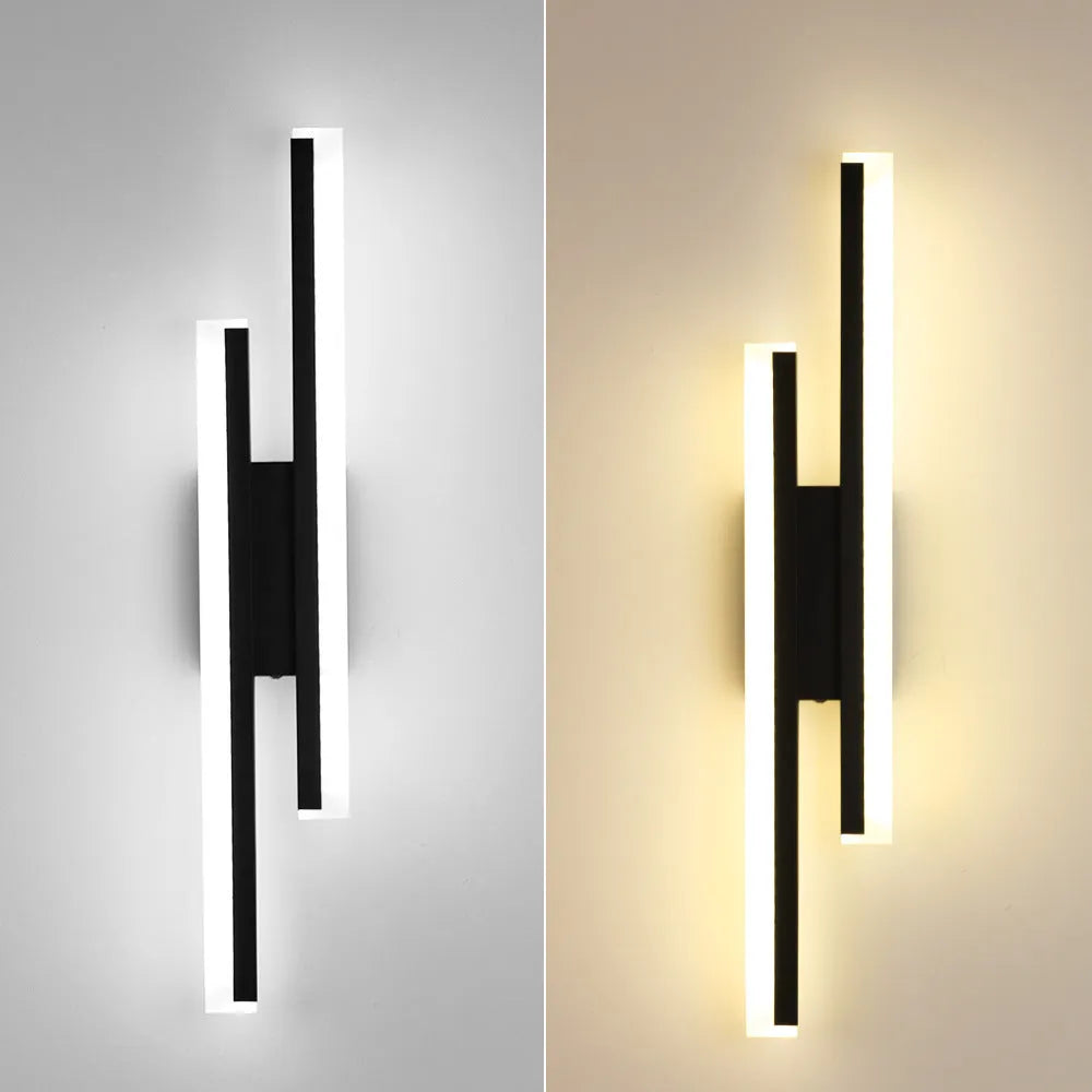 Modern gold double line wall lamp mounted on a wall, showing its 500mm length and artistic design for background lighting.