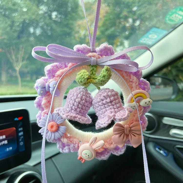 Handmade wool bell orchid car pendant hanging from rear-view mirror