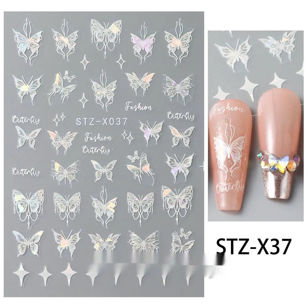 Pack of black and silver striped nail art stickers with cartoon and love pattern designs.