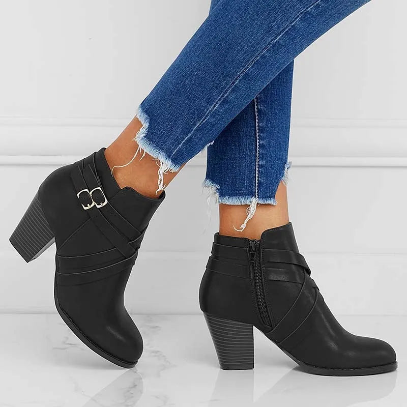 Grey plus size women's ankle boots with 7cm heel, side zip and belt buckle.