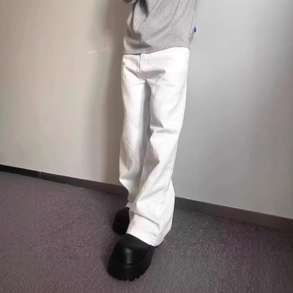 Men's white straight-leg denim jeans with a mid waist and zipper fly on a neutral background.