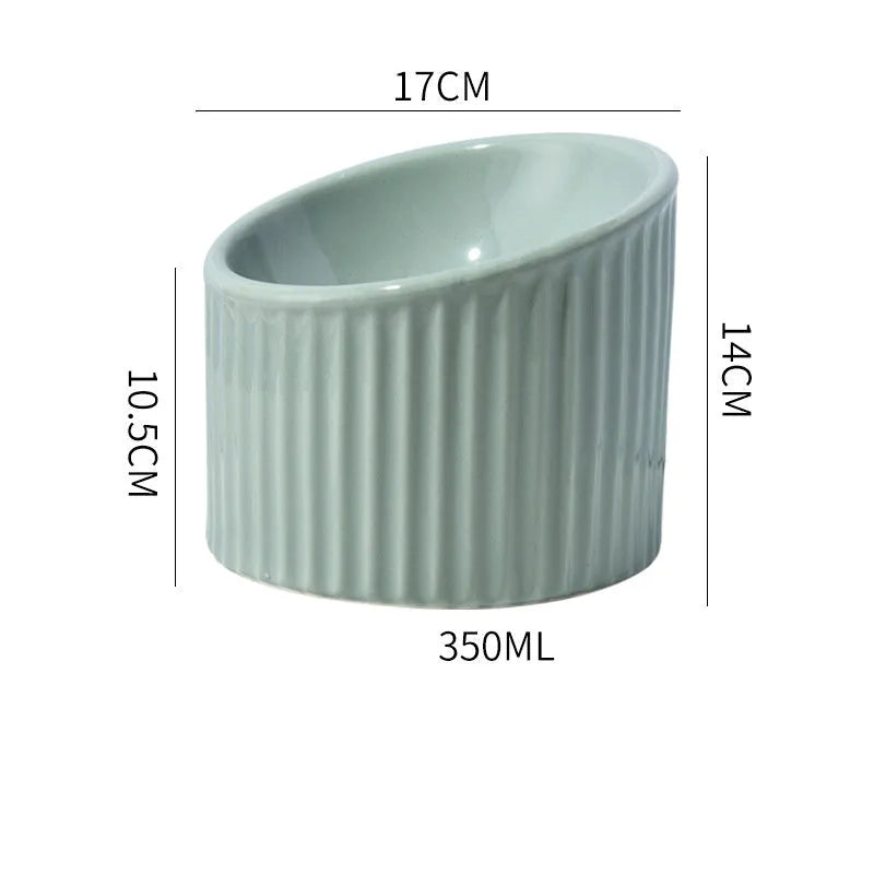 Ceramic elevated cat bowl in round tilted design with raised height for indoor cats