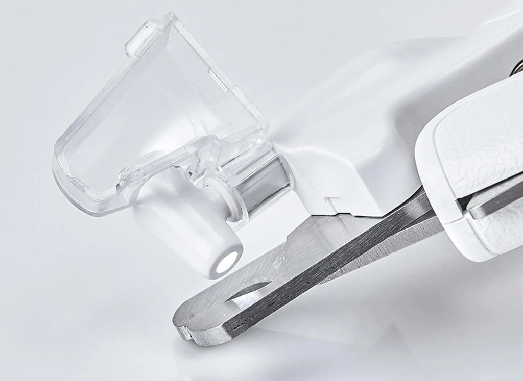 White pet nail clippers with LED light and transparent anti-splash guard for cats and dogs