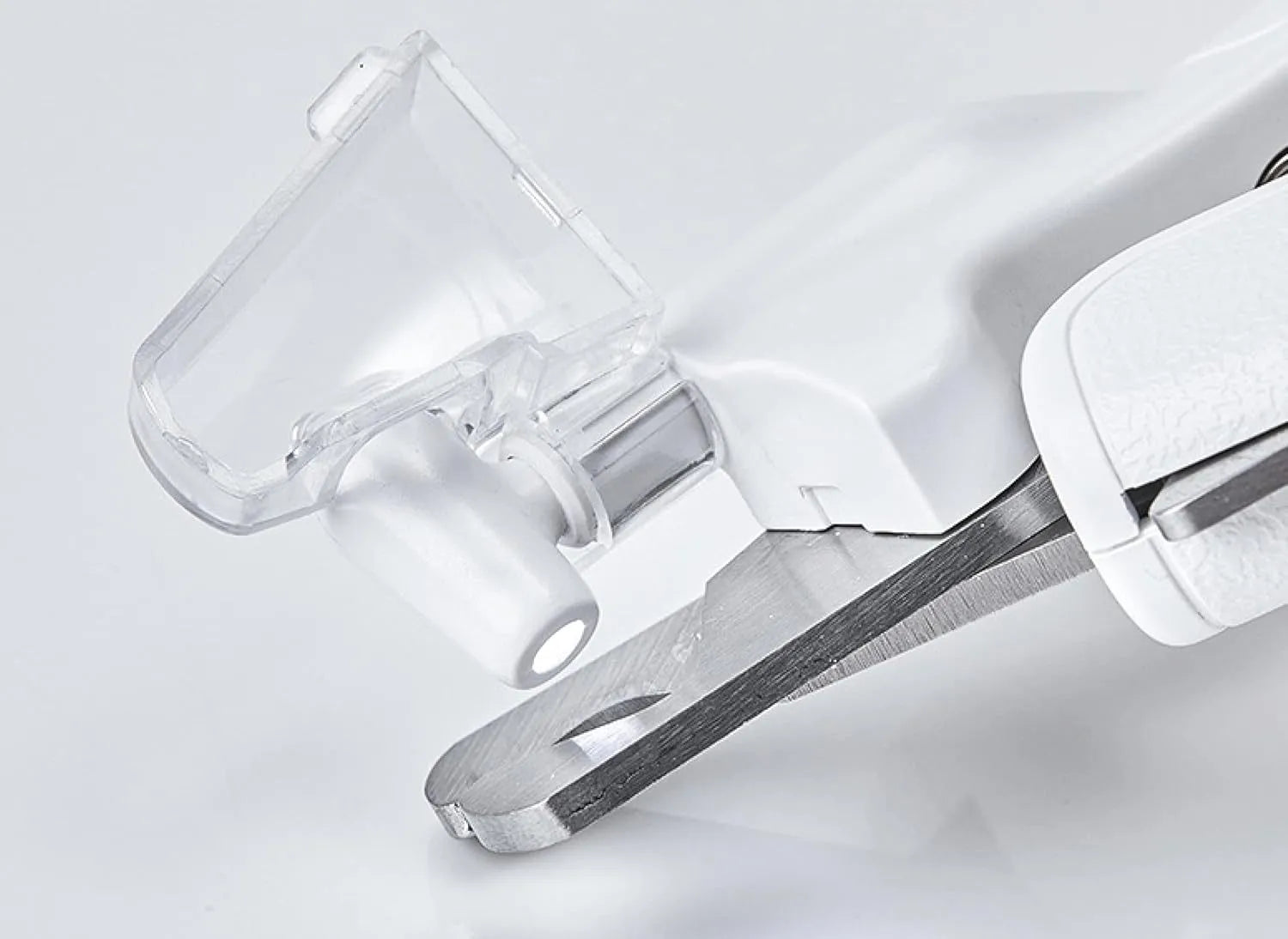 White pet nail clippers with LED light and transparent anti-splash guard for cats and dogs