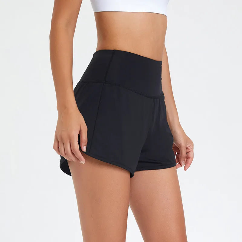 Women's high-waist nylon fitness shorts in black, white, and water blue colours