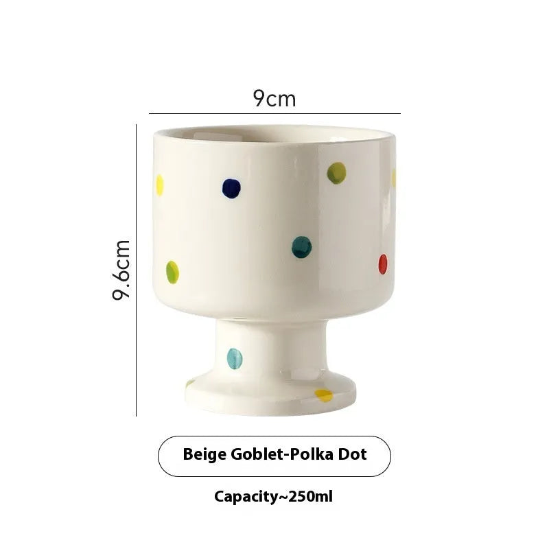 Hand-pinched irregular ceramic mug in solid colour with modern design