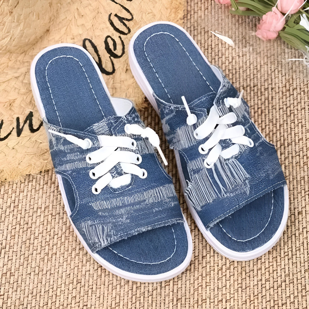 Blue Roman-style women's canvas slippers with cloth lining and rubber sole