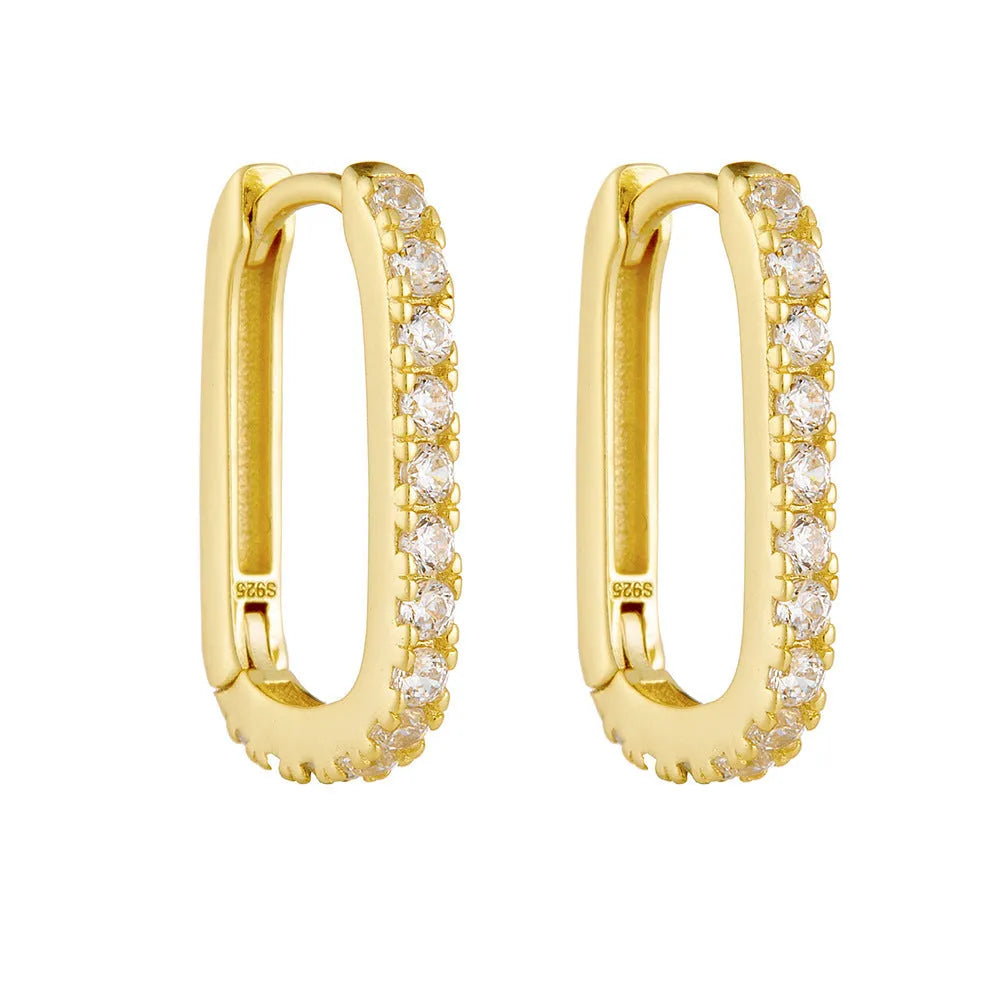 Sterling silver oval zircon ear clips with geometric design in white or yellow finish