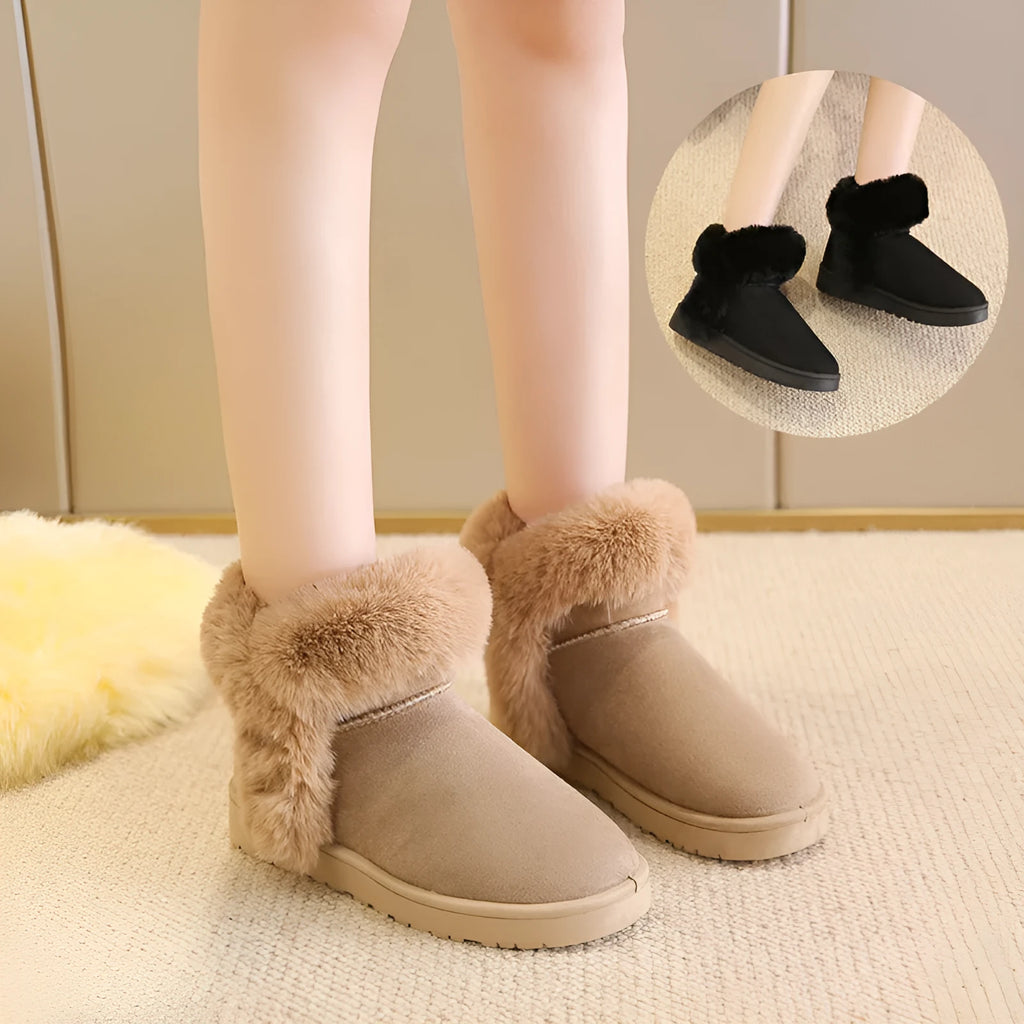 Women's winter snow boots in beige with fluffy platform, round toe, and artificial wool lining on a white background