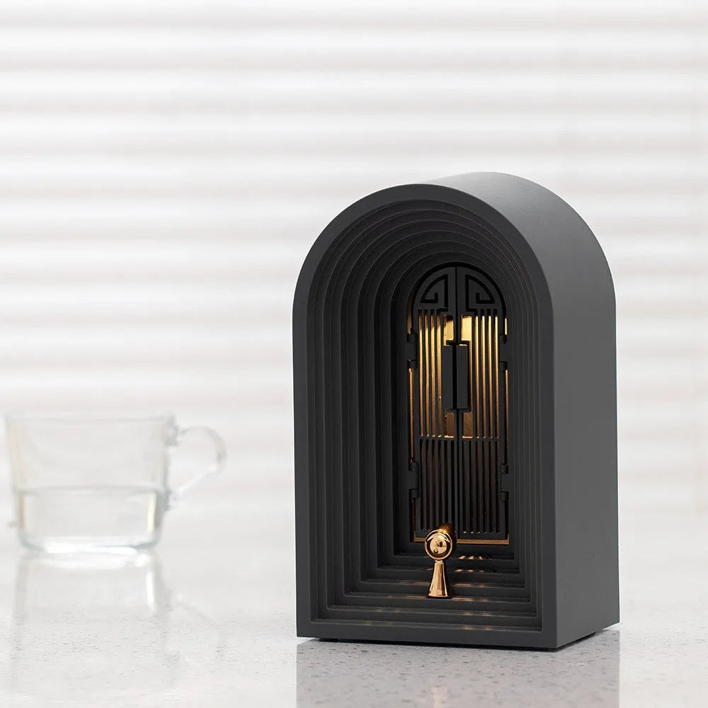 Nordic LED table lamp with Bluetooth speaker in white, plastic shade, compact bedside design