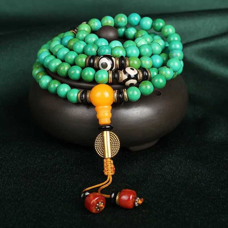 Natural turquoise beaded bracelet with 108 polished 8mm round beads in a national style.