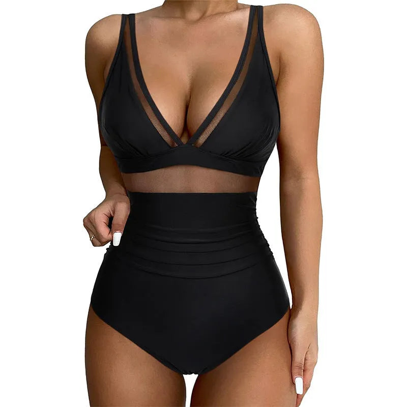 Black women's halter neck one-piece swimsuit with mesh detail and high-cut briefs.