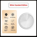White round section Bluetooth tracker with strong magnetic suction on a metal surface, compatible with smartphones for anti-loss tracking