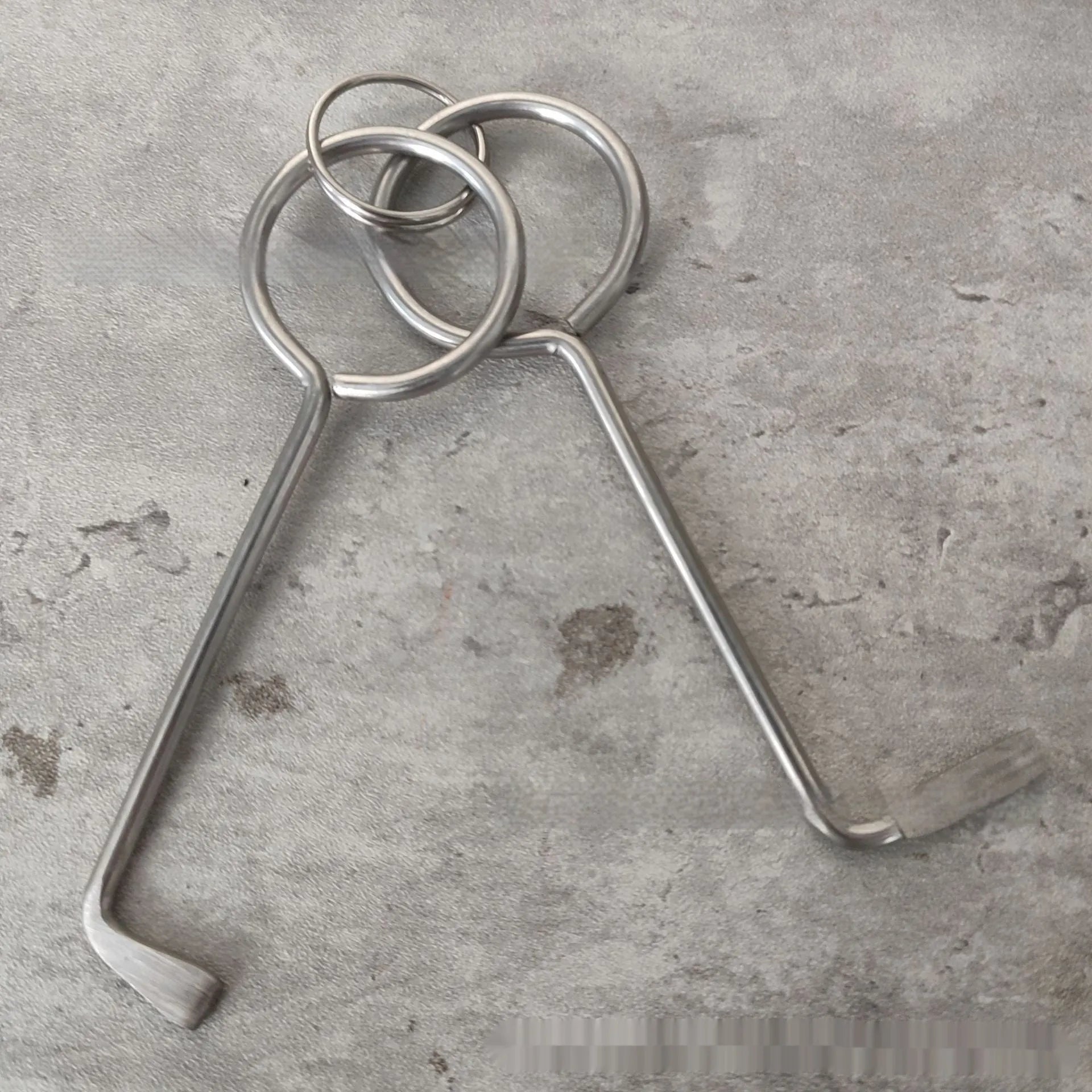 Two alloy wrench tools displayed together as portable set for household and automotive repairs