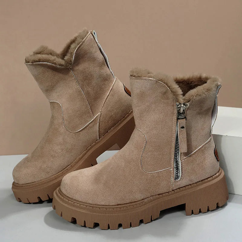 Women's black thick plush high top snow boots with side zipper and round toe on a rubber sole.
