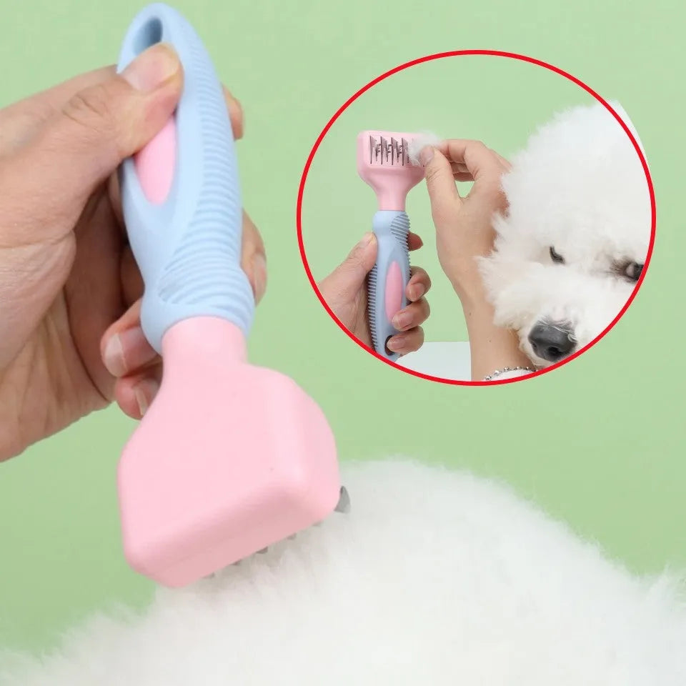 Pink stainless steel dog comb and brush tool with a knot knife edge for pet grooming.