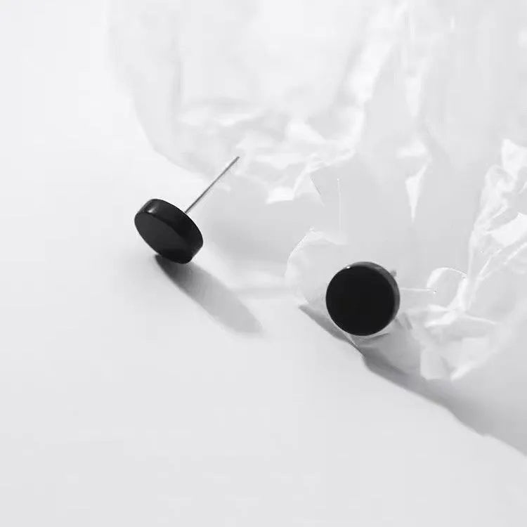 Sterling silver S999 flat ear bone studs in silver and black electroplated finishes