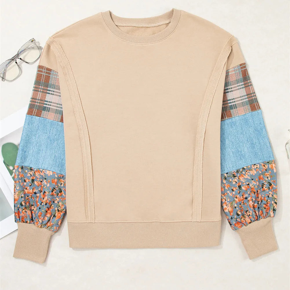 Women's loose plaid long-sleeved casual top in apricot colour on a hanger.