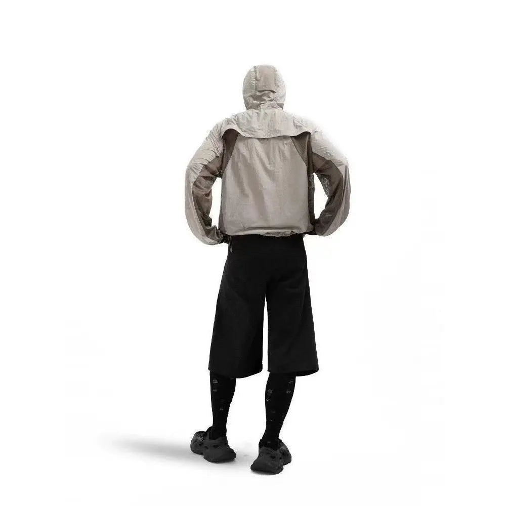 Mesh stitching sun protective clothing in desert brown colour showing ventilation design and regular length cut