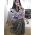 Purple women's sleeveless blouse with round neck and hollow out detailing on mannequin.