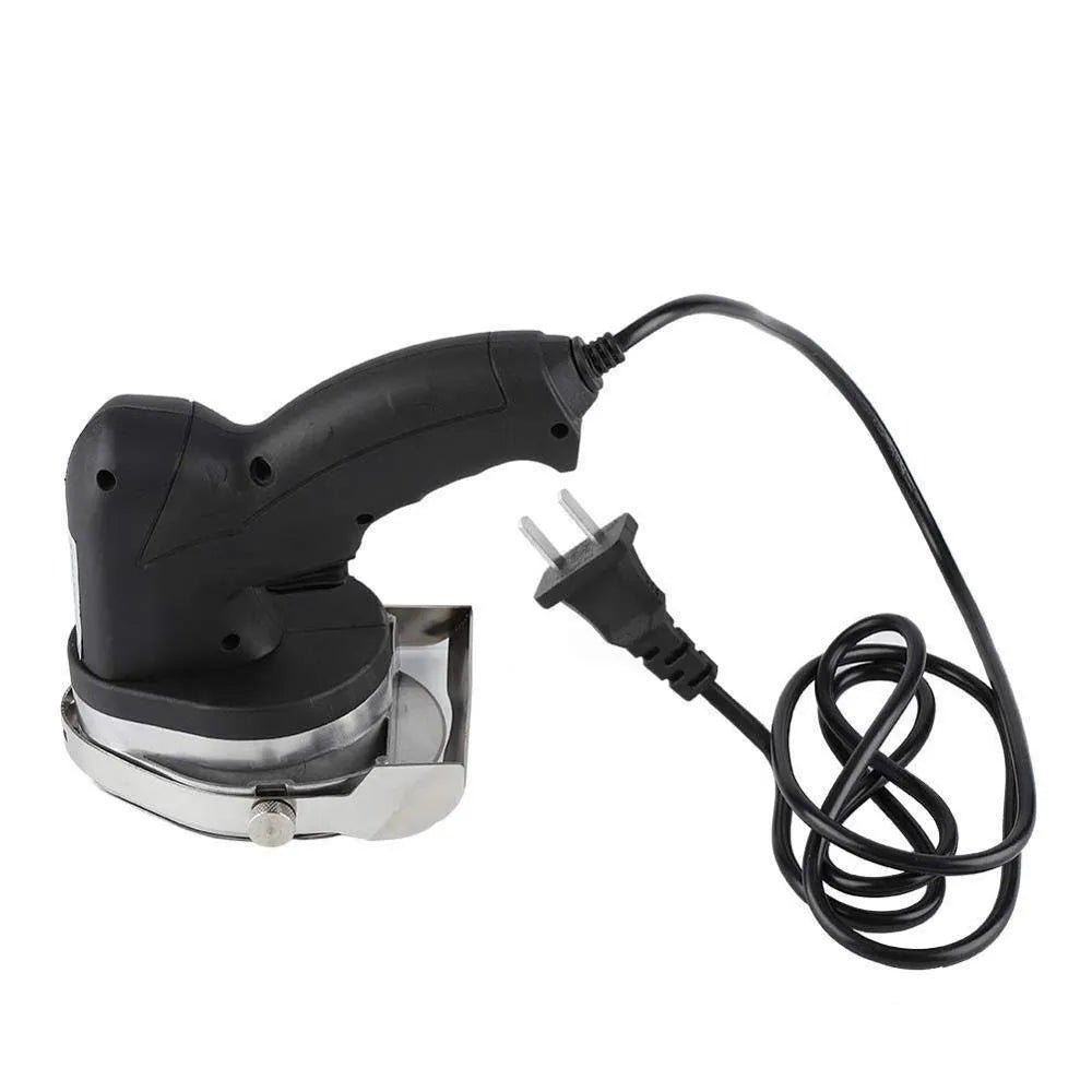 Black electric meat cleaver with blade for turkey barbecue machine, showing EU plug.