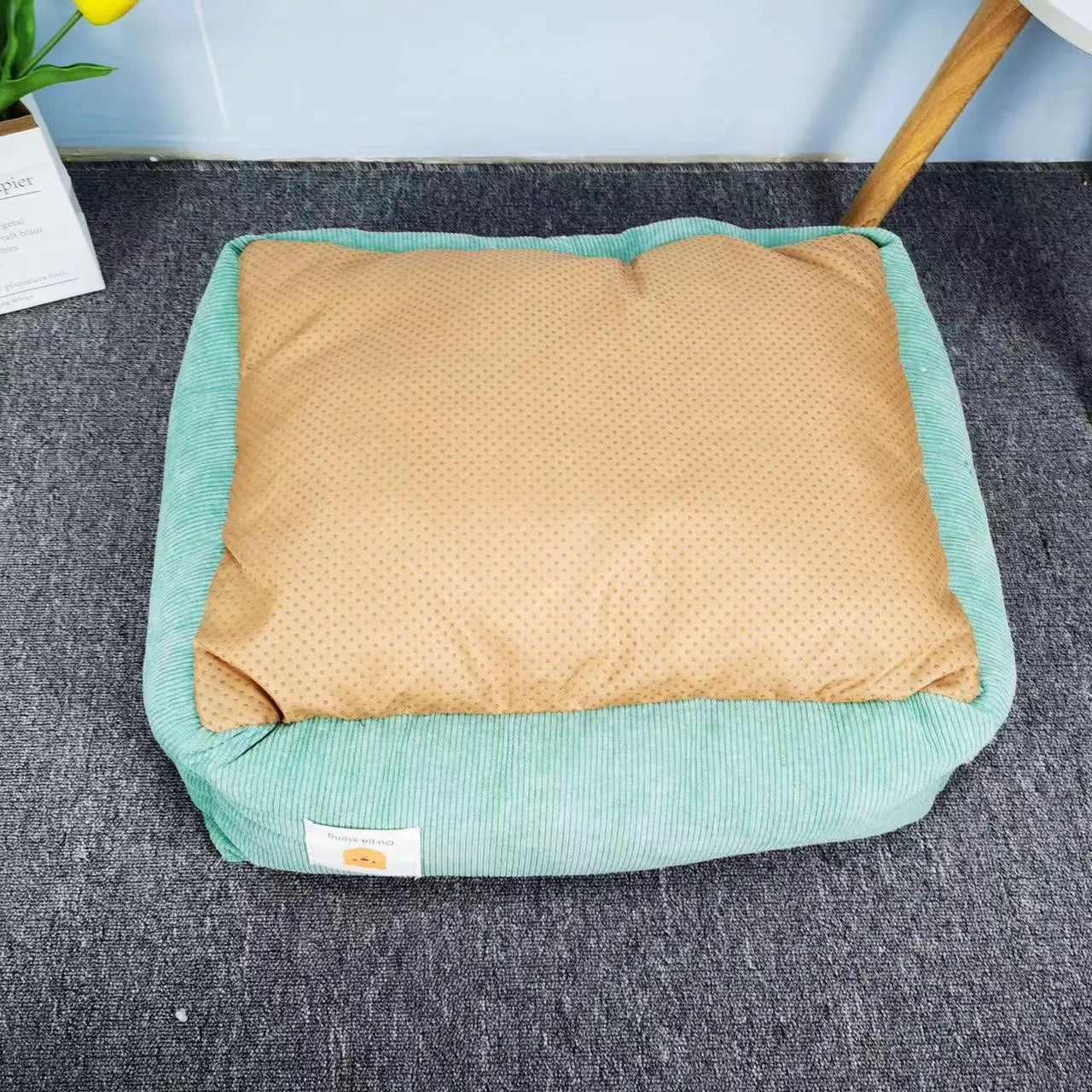 Light blue winter dog nest with soft velvet lining, shown in a 50x40cm size.
