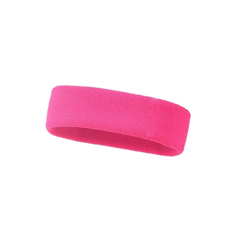 Elastic solid colour sports anti-sweat headband in blue on a white background.