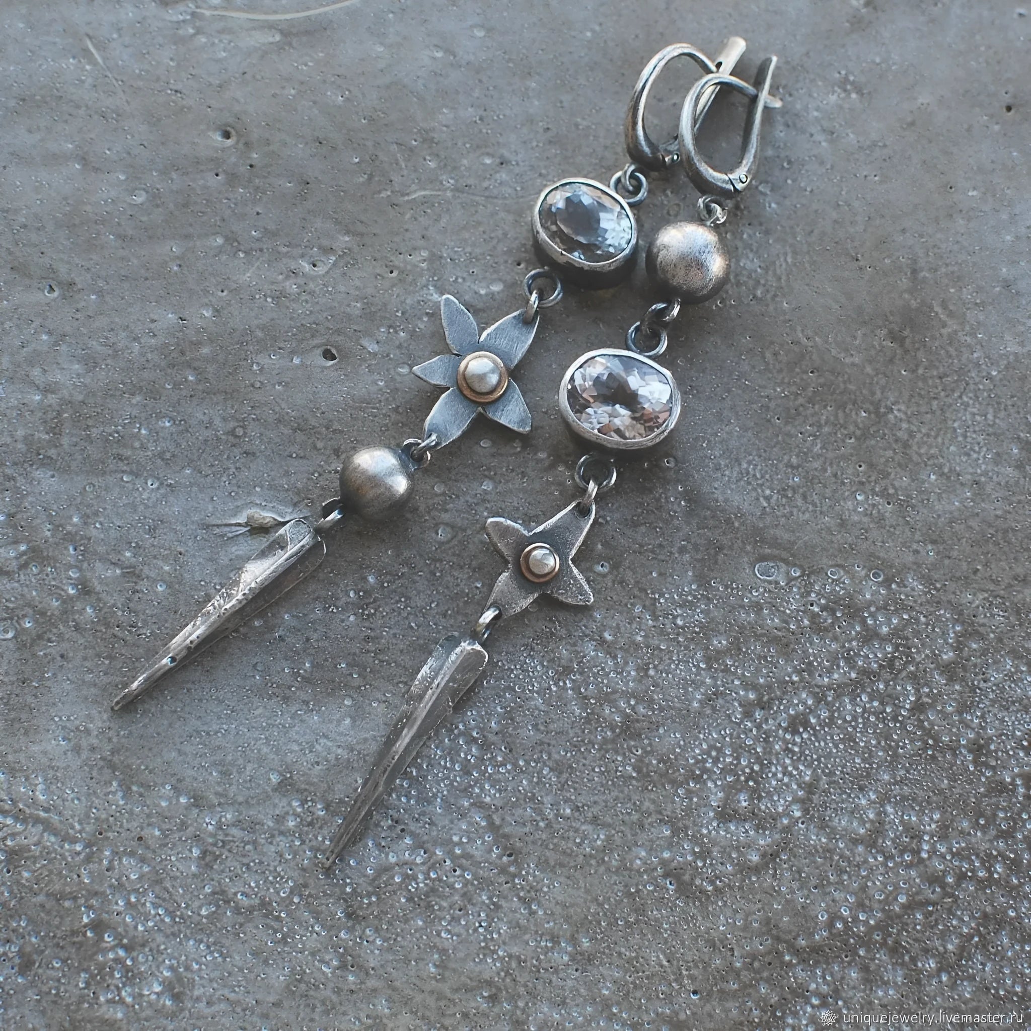 Geometric antique silver pendant earrings with XINGX design and rhinestone accents