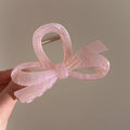 Women's ice bowknot resin hair clip with sweet bow design in blue, pink, and white colour options