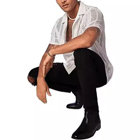 A man wearing a black jacquard-knit short-sleeved shirt in a street fashion cardigan style.