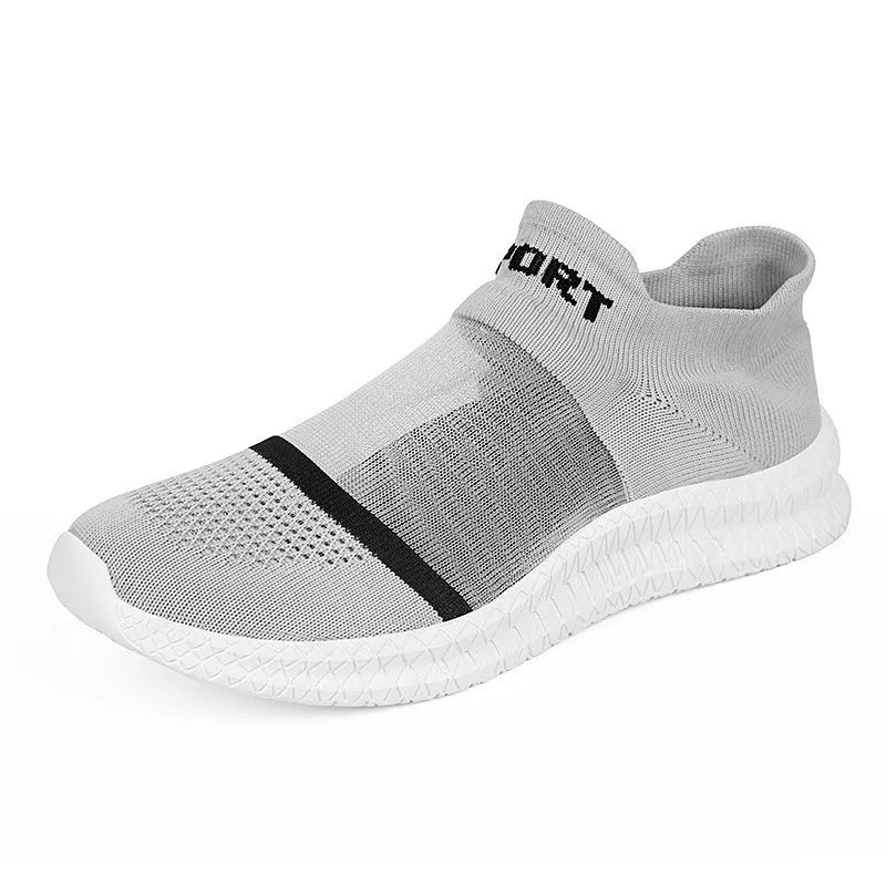Flyknit casual sock shoes in khaki colour with lace-up front and tassel detail on a flat MD sole.