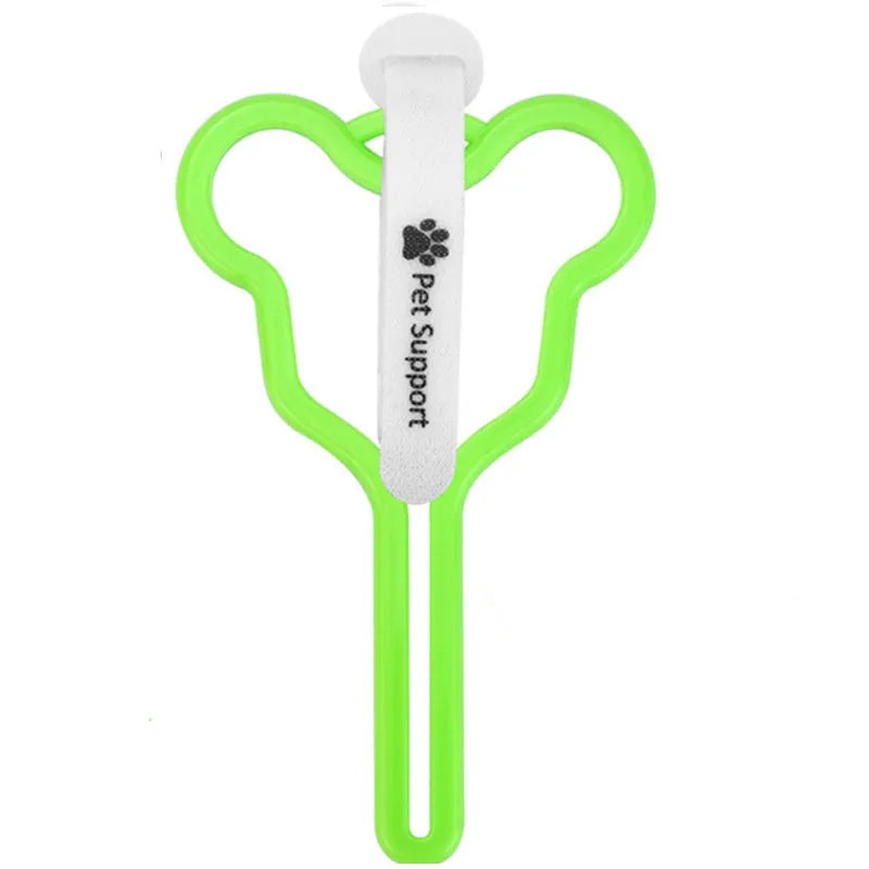 A coloured hands-free dog poop bag holder with a fixed clip and velcro strap attached to a dog leash.