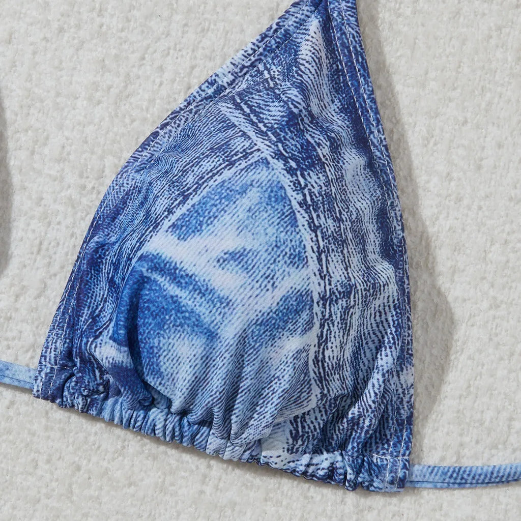 Women's denim blue printed bikini swimsuit with decorative strap detailing