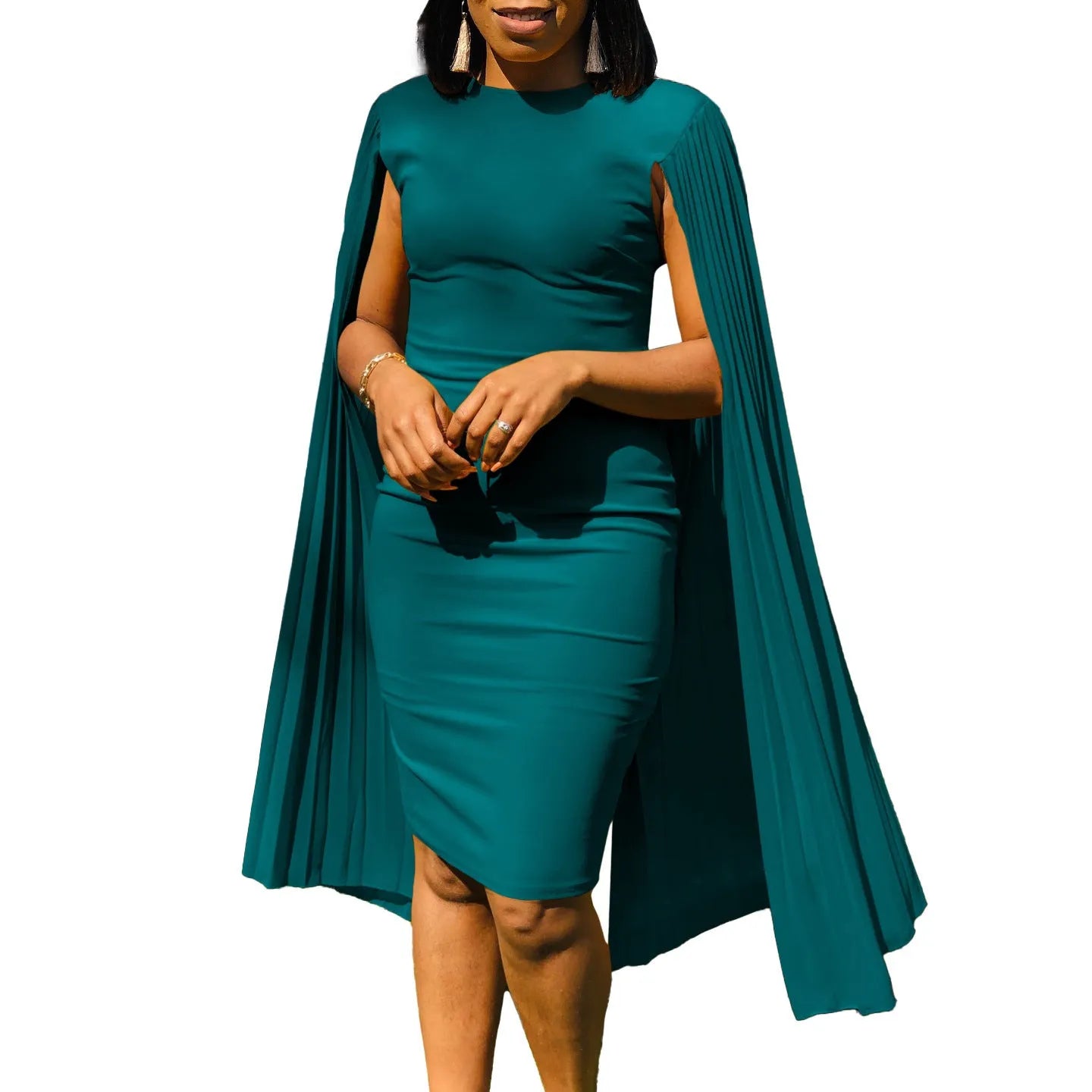 Yellow long sleeve evening gown with a high waist and pleated shawl collar on a mannequin.