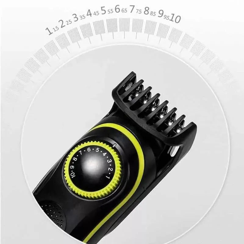 Black household electric hair clipper with USB charging cable and cleaning brush on a white background.