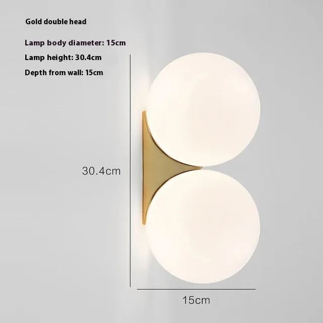 Nordic double-headed gold wall lamp with glass ball shade for bedroom bedside