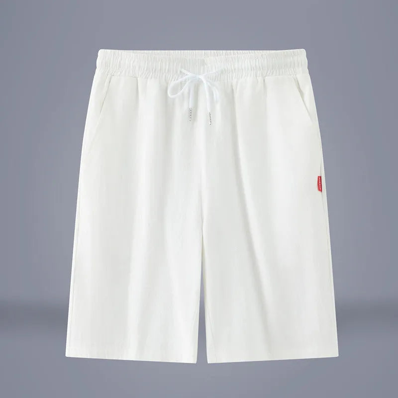 Chinese style solid colour cropped pants in cotton linen fabric on a neutral background.