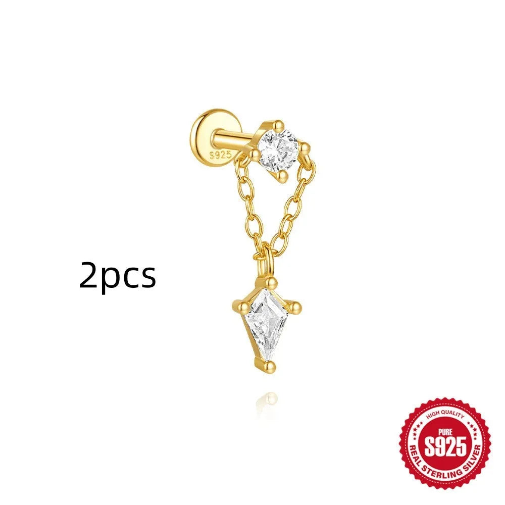S925 sterling silver geometric kite earring with rhinestones and a chain tassel in a gold colour.