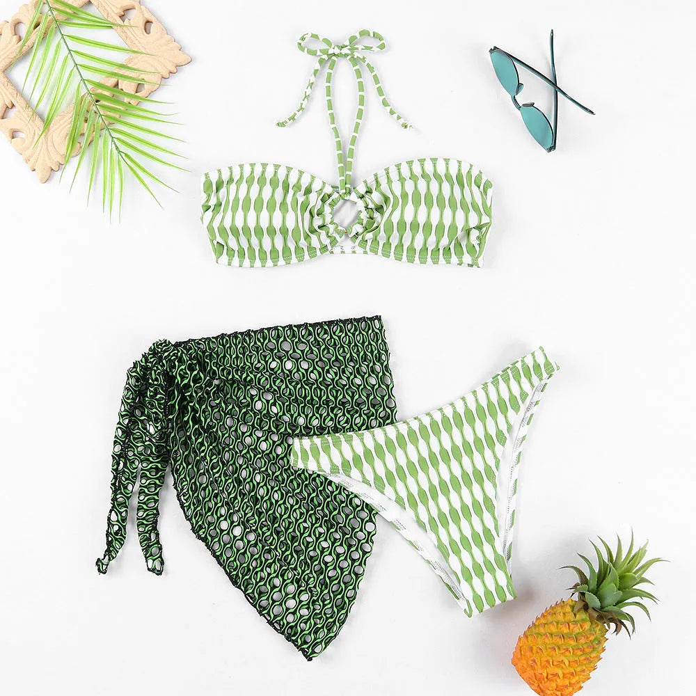 Women's striped three-piece swimsuit set with tube top, shorts, and waist skirt hem