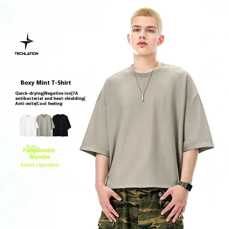 Men's sand grey loose-fit short sleeve T-shirt with quick-drying fabric on a hanger.