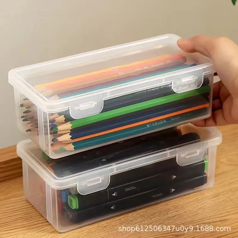 Transparent PP plastic stationery storage box with pencils and art supplies visible inside