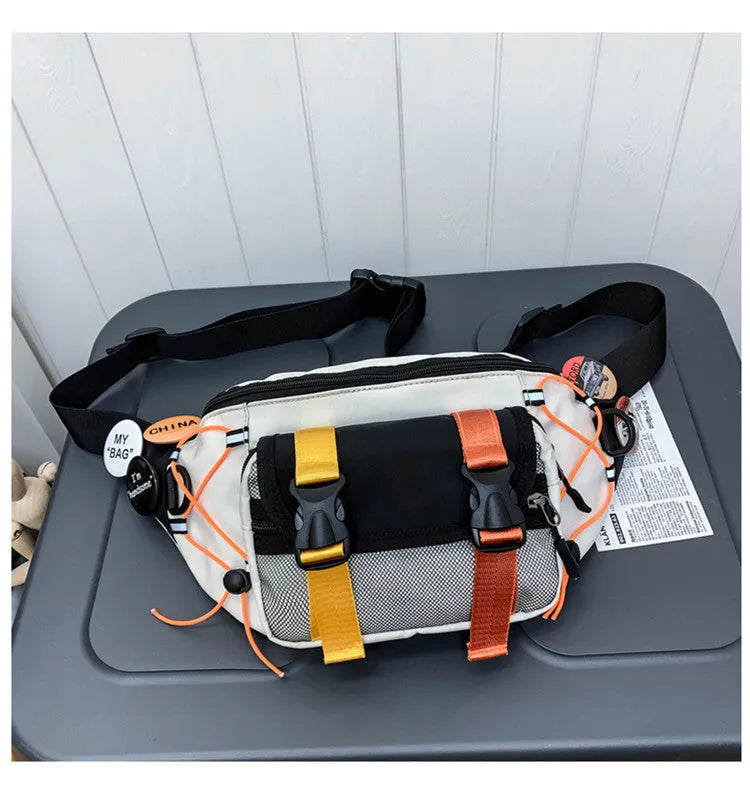 Fashion brand ladies nylon messenger bag with bungee style, black with badge, medium size, plain pattern