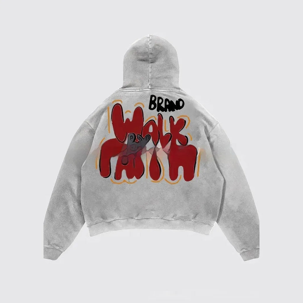Women's grey hoodie with vintage character print, long sleeves, and side pockets.